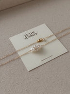 CREAM CROISSANT NECKLACE