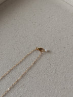 CREAM CROISSANT NECKLACE